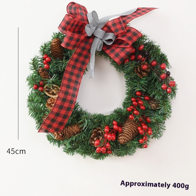 45cm Christmas wreath with pinecones, red berries, and red and black plaid ribbon bow