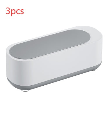 White and gray rectangular electronic device with rounded edges, shown with 3pcs text