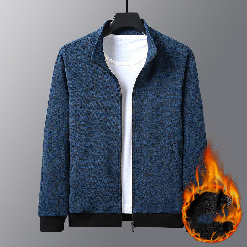 Blue zip-up fleece jacket with black cuffs and collar, displayed over white t-shirt, fire icon indicates warmth
