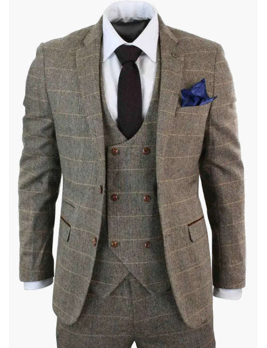 Men's brown checkered three-piece suit with white shirt, black tie, and blue pocket square
