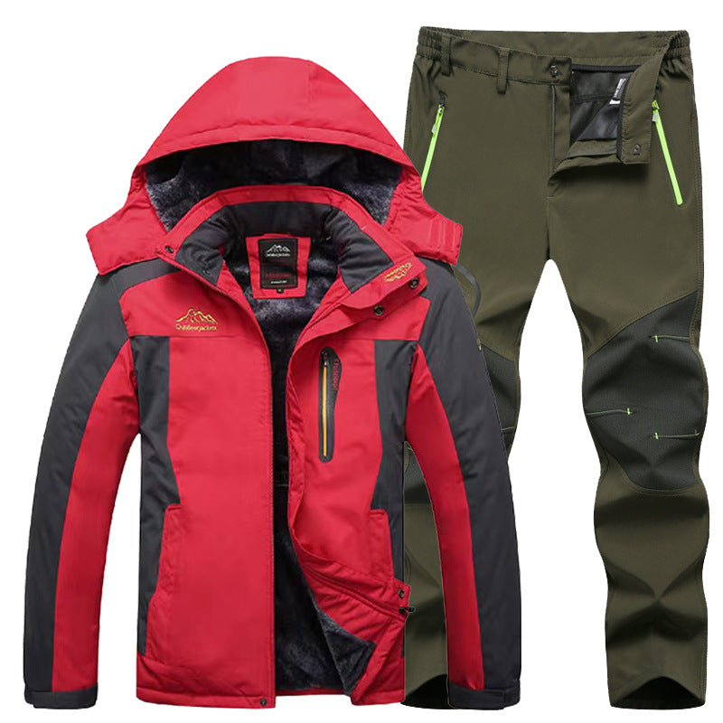 Men's red and black waterproof outdoor jacket with olive green hiking pants featuring reinforced knees and zipper pockets