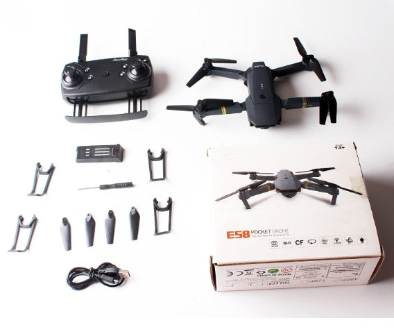 E58 pocket drone with remote controller, spare propellers, USB cable, screwdriver, and box on white background