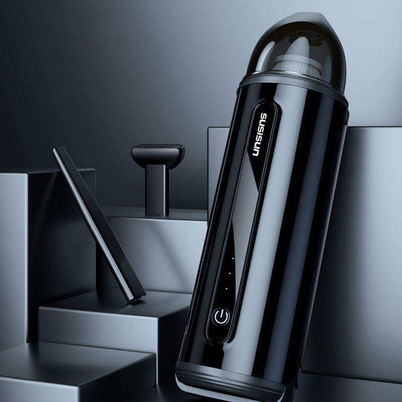 Black SUSISUN wireless mini handheld vacuum cleaner with power button and attachments on gray geometric background