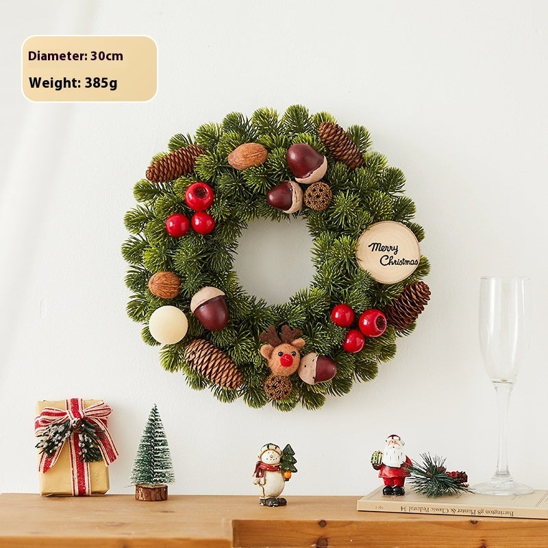 30cm Christmas wreath with pinecones, red berries, acorns, and a Merry Christmas wood sign
