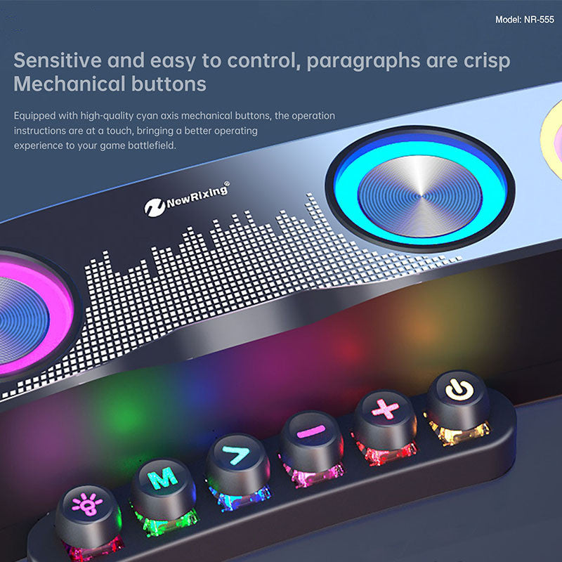 Close-up of NewRixing NR-555 gaming speaker with blue and pink LED-lit circular speakers and RGB mechanical buttons