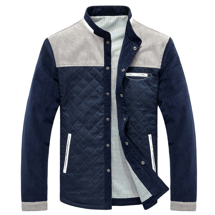 Men's slim fit casual jacket with quilted navy blue body and light gray shoulders, zip and snap button closure