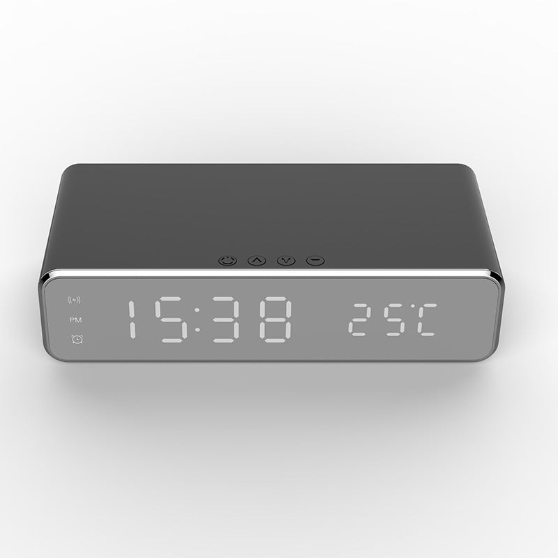 Sleek black digital alarm clock displaying 15:38 and 25°C with LED screen and control buttons