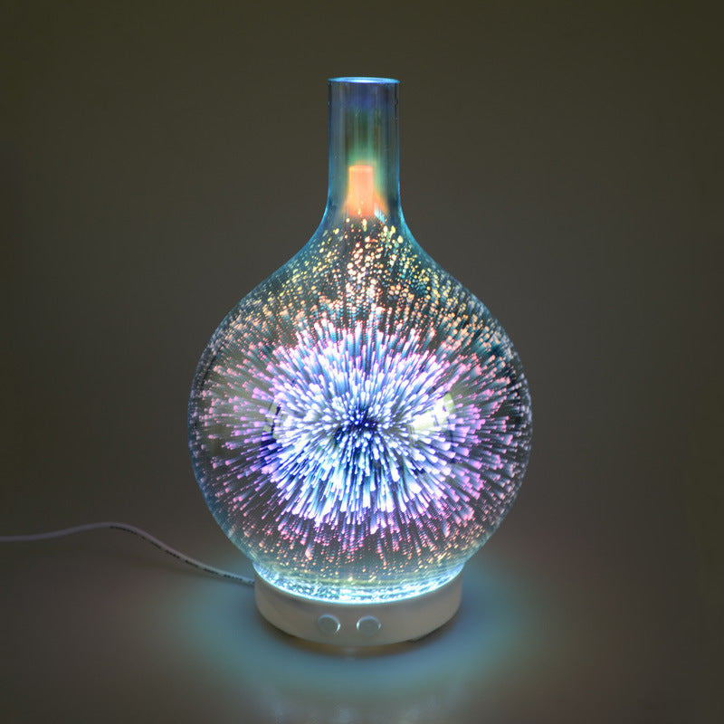 Glass ultrasonic diffuser with colorful 3D firework light display on white base