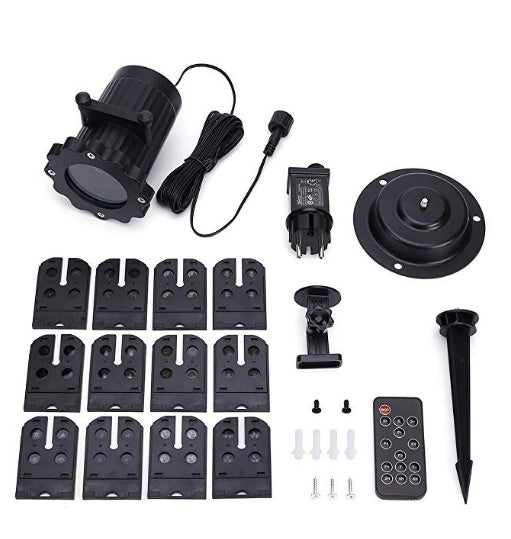 Outdoor LED laser projector light with 12 replaceable slide cards, remote, power adapter, and mounting accessories