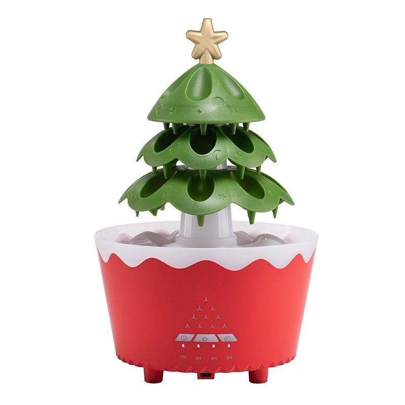 Christmas tree-shaped humidifier with red base and green tiers topped with gold star