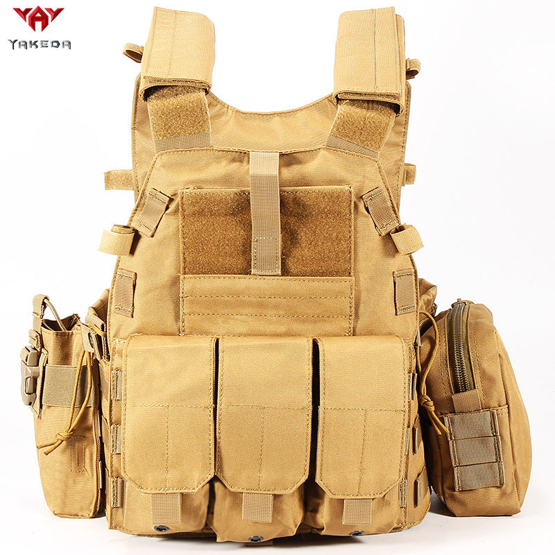 Tan tactical vest with multiple front pouches, adjustable shoulder straps, and a side pouch
