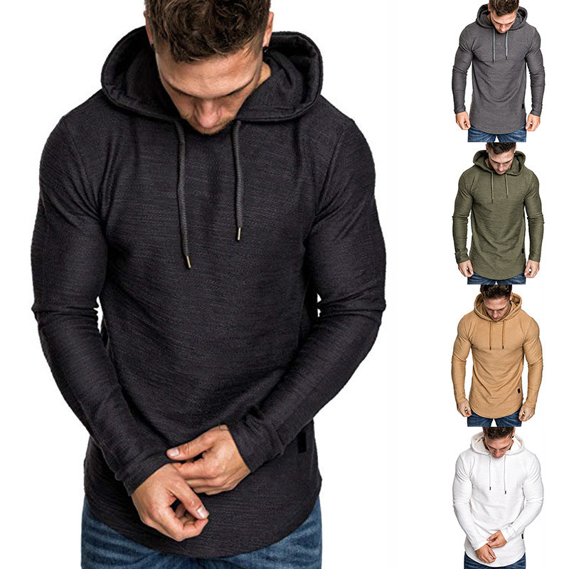 Man wearing slim fit hooded sweatshirt in black, gray, olive, tan, and white colors