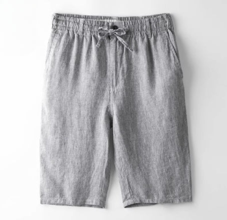 Grey casual linen shorts with elastic waistband and drawstring on white background