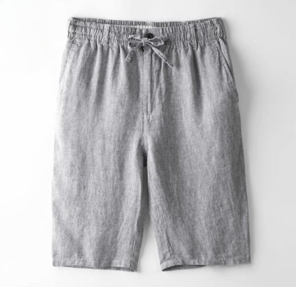 Grey casual linen shorts with elastic waistband and drawstring on white background