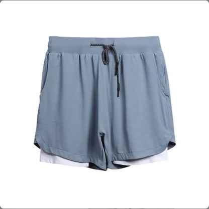 Light blue men's athletic shorts with white inner lining and black drawstring