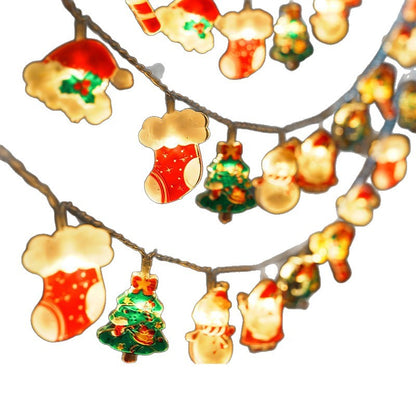 Festive Christmas string lights featuring glowing stockings, Christmas trees, snowmen, and Santa hats