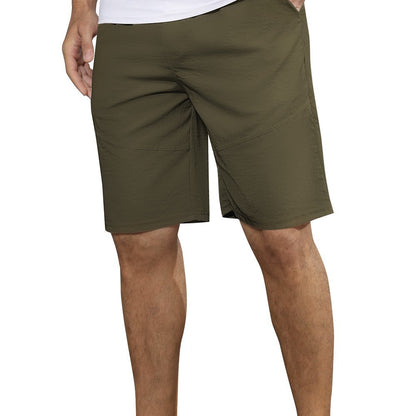 Men's olive green casual shorts with side and front pockets, styled for summer wear