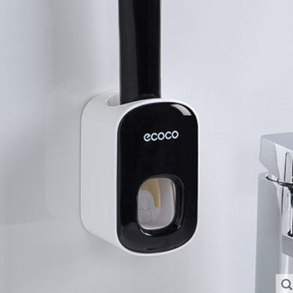 Ecoco black and white wall-mounted toothbrush holder in modern bathroom