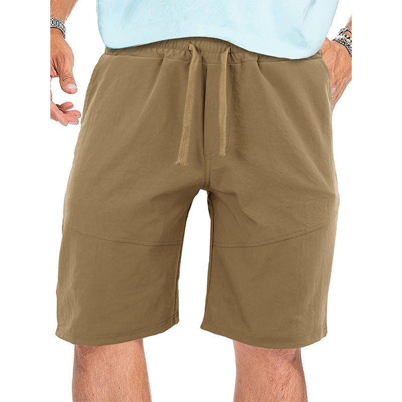 Men's casual khaki elastic waist drawstring shorts with front pocket detail