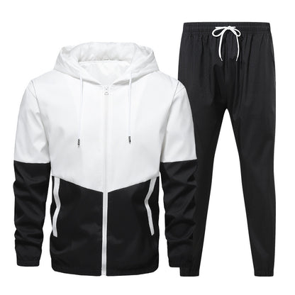 Men's black and white zip-up hoodie with matching black jogger pants sportswear set