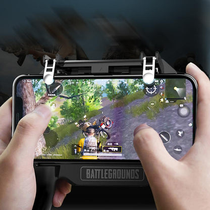 Hands holding a smartphone with PUBG mobile gameplay using a Battlegrounds gaming controller with triggers