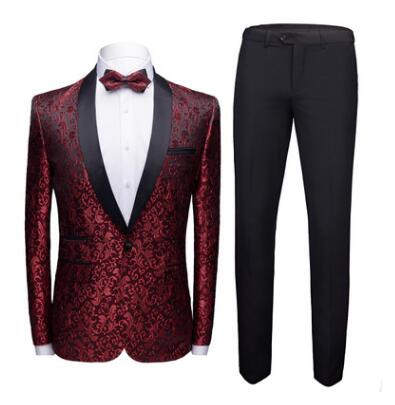 Red floral patterned tuxedo jacket with black lapels, white shirt, red bow tie, and black dress pants