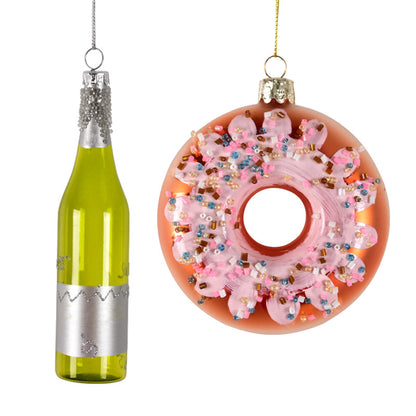 Christmas ornaments shaped like a green bottle and a pink frosted donut with colorful sprinkles