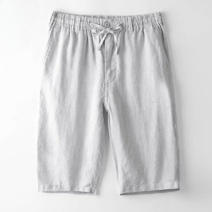 Light gray casual men's shorts with elastic waistband and drawstring on white background
