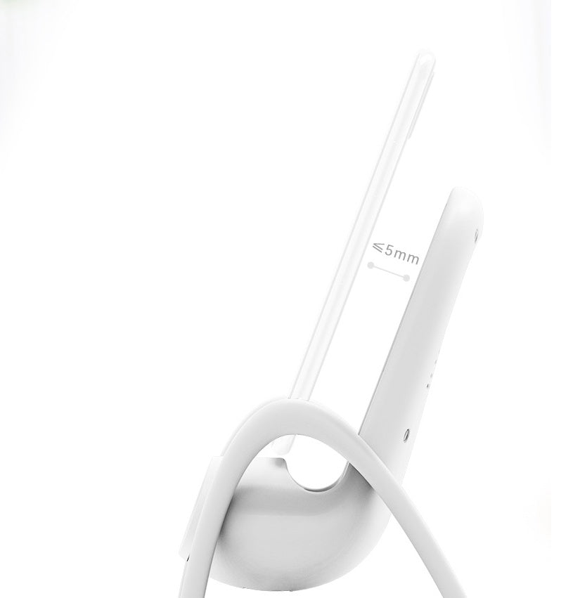 Close-up side view of white wireless Bluetooth headset with under 5mm microphone boom