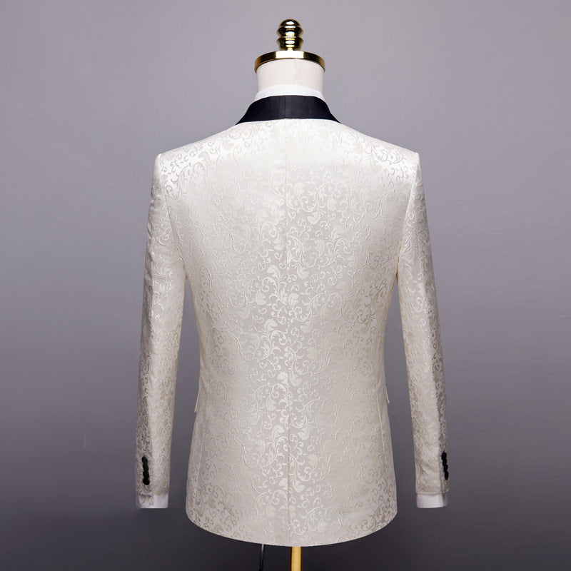 Back view of white floral jacquard tuxedo jacket with black satin collar on mannequin
