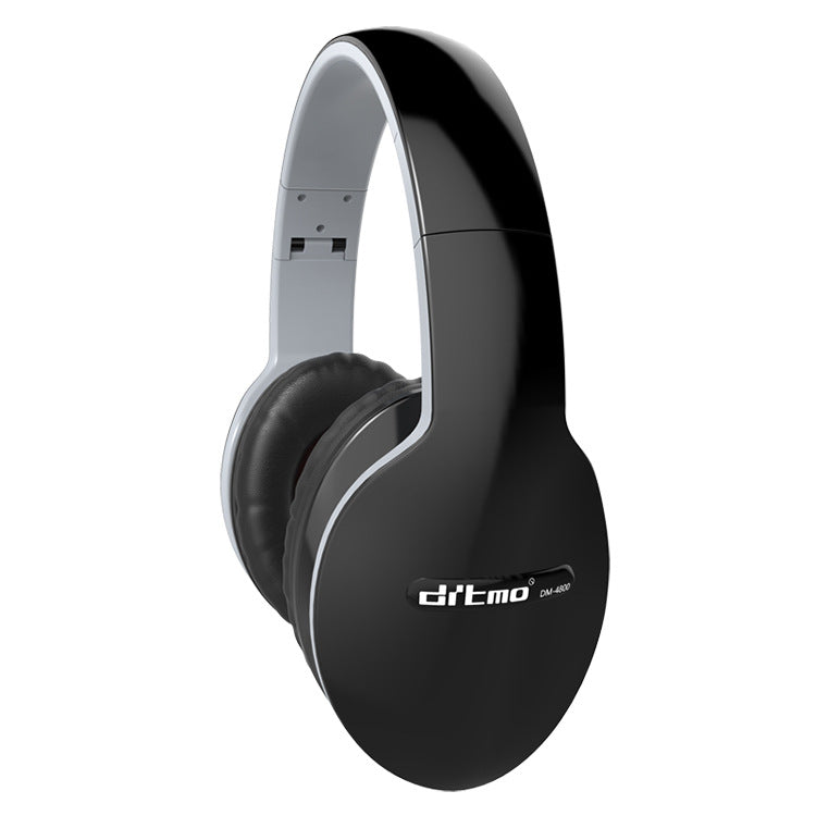 Black over-ear wireless headphones with cushioned ear cups and adjustable headband on white background
