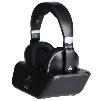 Black Artiste digital wireless over-ear headphones resting on charging base with cushioned ear pads