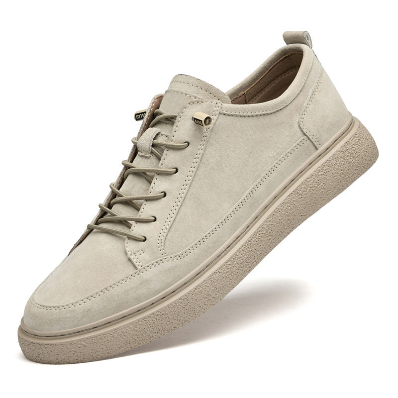 Beige casual suede sneaker with textured sole and lace-up design on white background