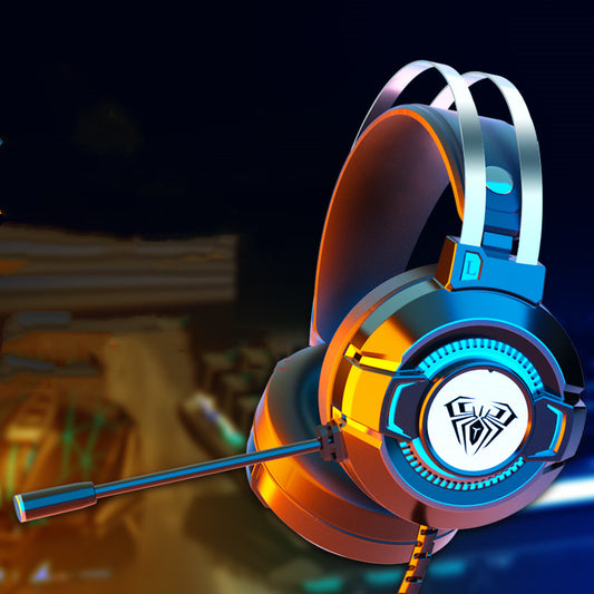 Modern gaming headset with microphone and spider logo, illuminated in orange and blue lighting