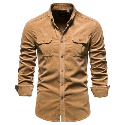Men's casual brown corduroy shirt with buttoned chest pockets and rolled-up sleeves