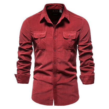 Men's long sleeve red corduroy shirt with buttoned flap chest pockets and collared neckline