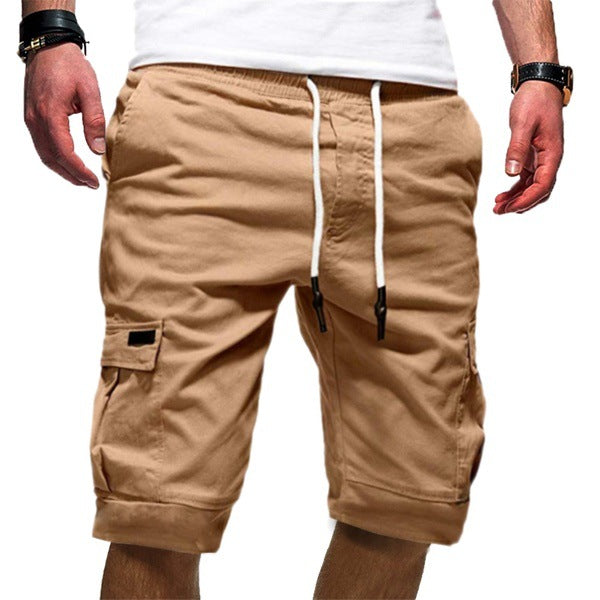 Men's casual tan cargo shorts with white drawstring and side pockets