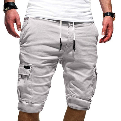Men's light gray cargo shorts with drawstring waist and side pockets, worn with white shirt