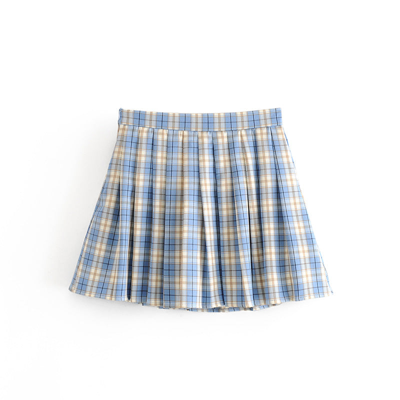 Blue and beige plaid pleated mini skirt on white background