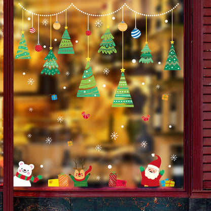 Christmas window decoration with hanging trees, ornaments, snowflakes, gift boxes, Santa, reindeer, and polar bear