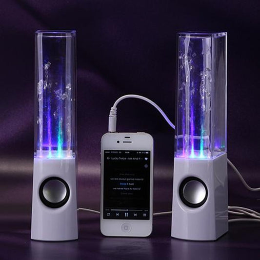 White water dancing speakers with colorful LED lights connected to a smartphone with audio cable