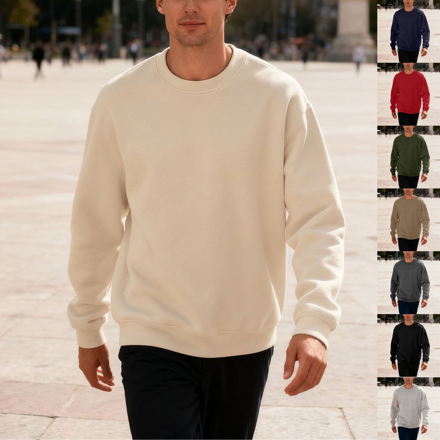 Man wearing beige crewneck sweatshirt walking outdoors with casual black pants