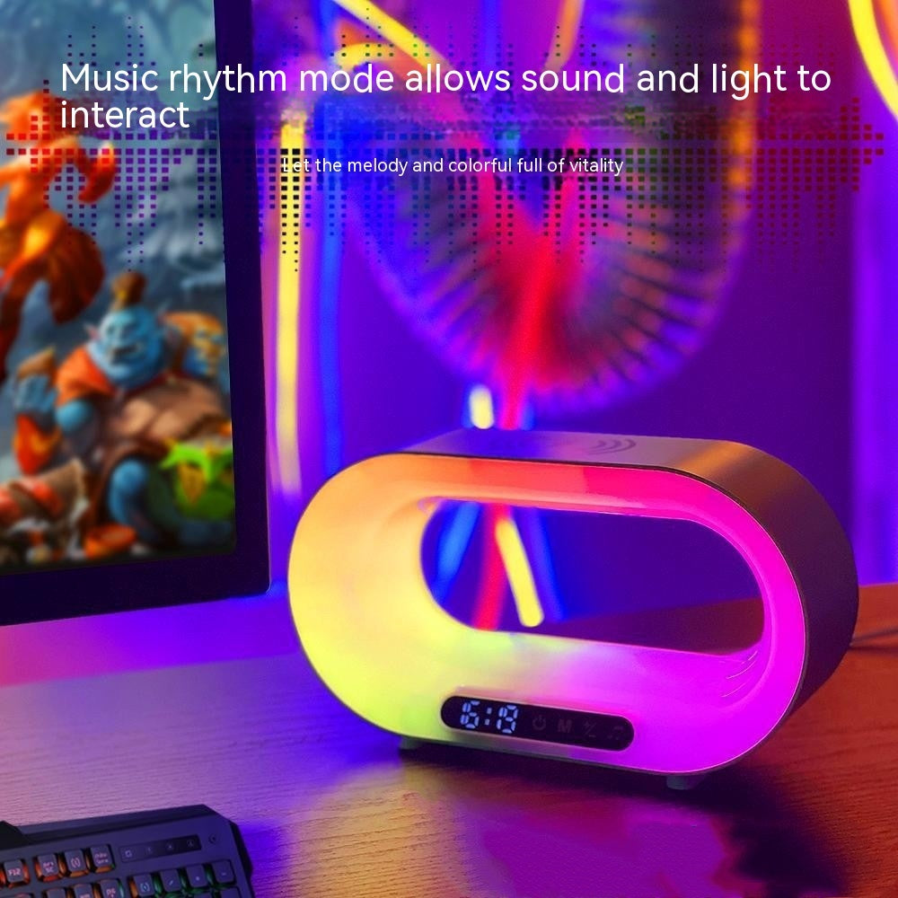 Colorful LED music rhythm light on desk with digital clock and gaming setup background