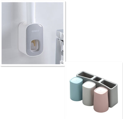 Ecoco white wall-mounted toothbrush holder and pastel-colored three-cup tumbler set with organizer