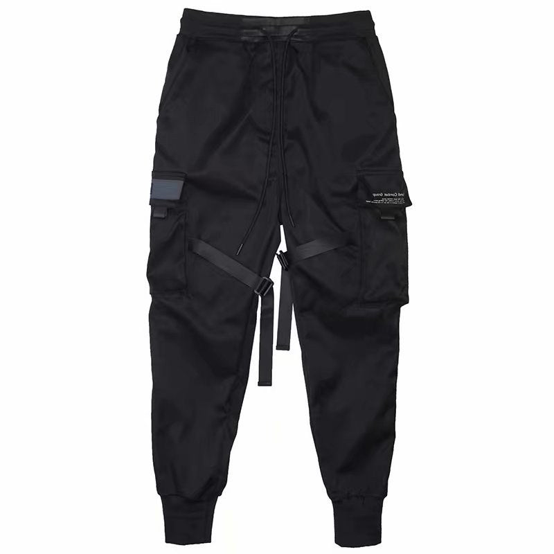 Black cargo jogger pants with multiple pockets, adjustable straps, drawstring waist, and cuffed ankles