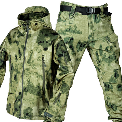Military green camouflage tactical jacket and cargo pants with black belt isolated on white