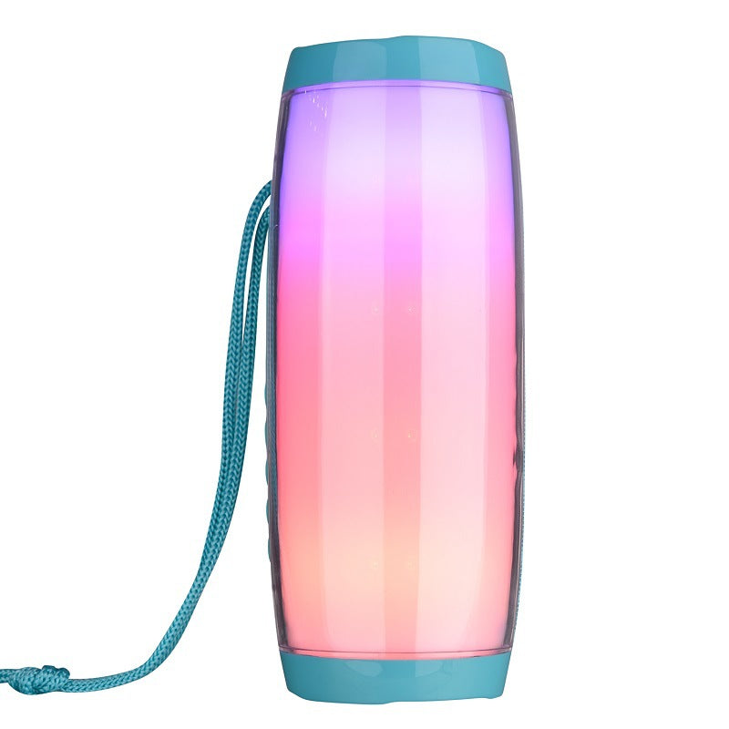Portable wireless Bluetooth speaker with gradient pink to purple light and blue strap