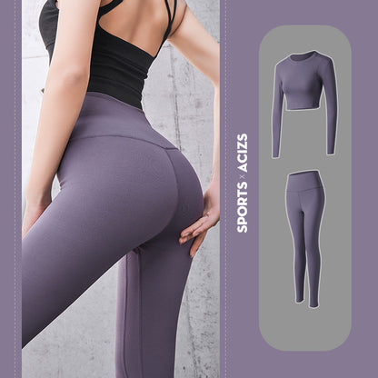Woman wearing purple high-waist leggings and black sports bra, modeling activewear set
