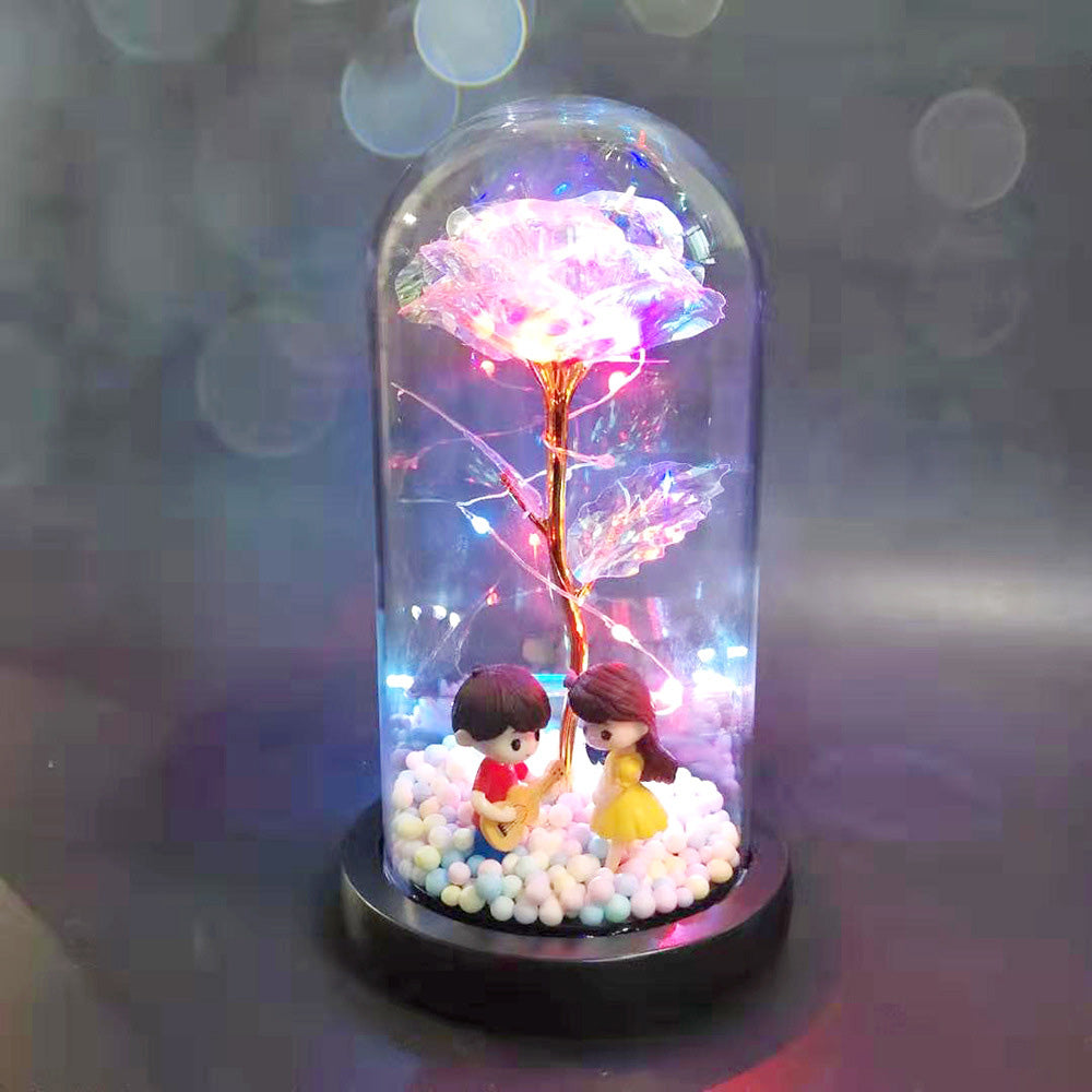 LED light decorative glass dome with glowing flower and couple figurines playing guitar