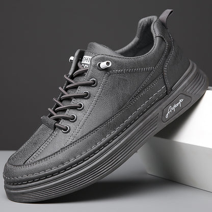 Close-up of stylish black leather casual sneaker with detailed stitching and thick ribbed sole